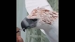 Painting the fondant Philippine Eagle head. #cake #fondant #eagle #philippineeagle