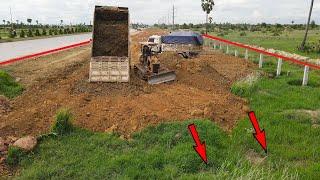 Start Every Day Good Action With Old bulldozer but strong pushing land Near Highway