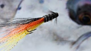 German Snaelda an icelandic fly pattern owing its name to the colors of the German national flag