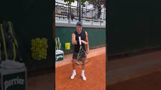 Do you think you could do this racquet trick?  #tennis #racquettrick #holgerrune #coachmouratoglou