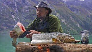 Giant salmon cooked under a thick layer of living salt over the fire ASMR Outdoor cooking