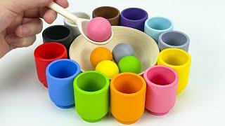 unpacking and review of a wooden educational sorter Rainbow Balls and Cups