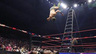 Sammy Guevara Swanton Bombs Will Hobbs off the Ladder through the TABLES