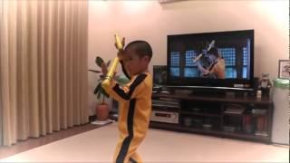 Little Kid Imitates Bruce Lees Nunchaku Scene