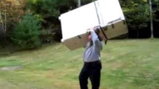 Old Man Lifts Fridge Over His Head