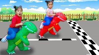 Suri and Annie Dress Up with Cute Dinosaur Inflatable Costumes