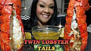 TWIN LOBSTER TAILS IN TAMZ TABLE SEAFOOD BUTTER SAUCE 