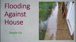 Cutting a swale to relieve driveway and crawlspace flooding