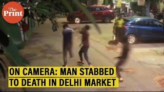 On camera Men assault stab 25-year old in a crowded Delhi market