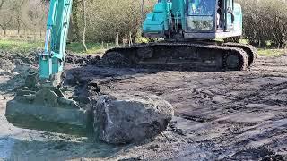 Digging a Pond with an Excavator