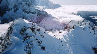Skiing high above the clouds in Chamonix France  Les Grands Montets by drone 4K