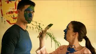 Robbie Amell covered in paint