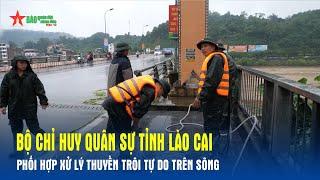 Bộ Chỉ huy Quân sự tỉnh Lào Cai phối hợp xử lý thuyền trôi tự do trên sông - Báo QĐND