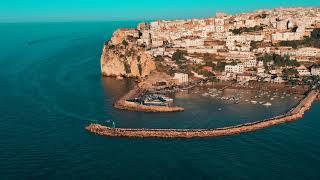 Aerial drone 4K video of coastal town of Peschici Gargano Puglia Italy