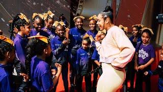 Bianca Belair shares a special moment with the Divas of Compton