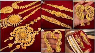 20 গ্রামের মধ্যে বড় লকেট gold sitahar  14 গ্রামে ময়ূর full kaan  DUTTA GUINEA museum gold wristet