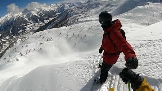 Skier & snowboarder freeriding in Davos Parsenn