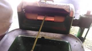 Using 1929 maytag to press sorghum juice