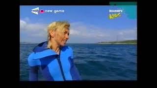 Michaela Strachan scuba diving in a blue wetsuit