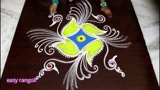 Creative Peacock rangoli art designs for New year 2019 - New year kolam & muggulu