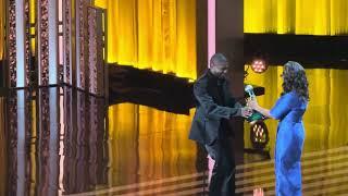 Oprah presenting Usher with Entertainer of the Year Award NAACP Image Awards 2024