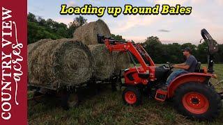 Getting the Round Bales off the Hay Field and We Got Round Bale Feeders for the Cows and Sheep