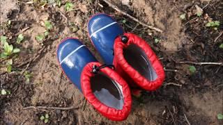 Rubber boots in water and mud