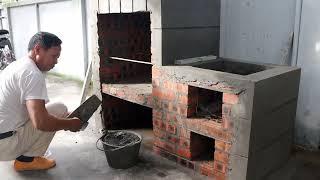 Build a multi-purpose wood stove from red bricks and cement at home