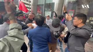 Supporters and Protesters of China Clash During APEC Forum  VOA News