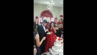 Angry groom loses it during wedding cake cutting ceremony leaving guests and bride horrified