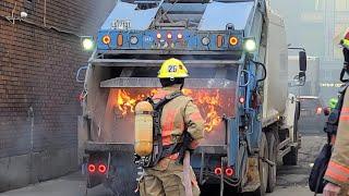  Garbage truck catches fire in the downtown core of Montreal during lunch hour 