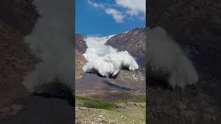 Crazy Video Massive Avalanche Strikes Photographer While Camera Rolls