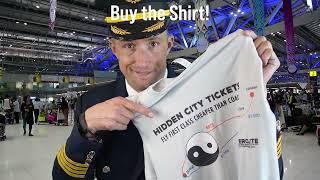 Hidden City Ticket Book-First Class for Free shirt and song.