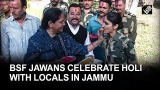 J&K BSF Jawans celebrate Holi with locals at International Border in Samba sector