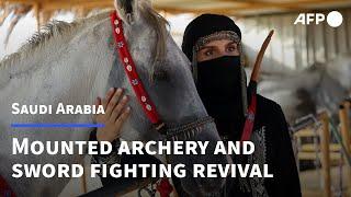 Saudi horsewoman revives buried tradition of mounted archery and sword fighting  AFP