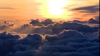 Above the clouds sunrise timelapse HD   Amanecer por encima de las nubes HD