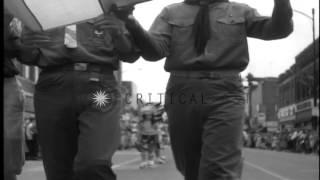 Soldiers and military band parade and officers lay wreath in Ottumwa Iowa for V...HD Stock Footage