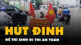 Gặp người chạy xe ôm giữa trưa hút đinh để thí sinh đi thi an toàn