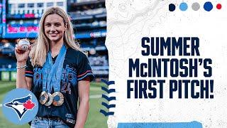 Three-time Olympic Champion Summer McIntosh throws the ceremonial first pitch for the Blue Jays