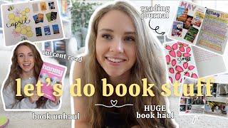 doing book things  reading journal book haul + unhaul current read + more