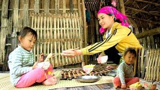 It was raining for a long time the woman made stuffed bamboo shoots and had lunch with her child.