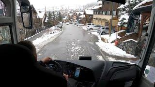 Bus drive in snowy mountain villages