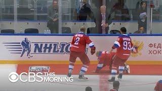 Putin falls while doing a victory lap during hockey game