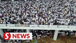 Indonesian Muslims celebrate Eid with mass prayers