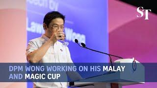 DPM Wong working on his Malay and magic cup