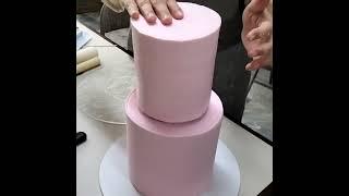 Tall 2 tier pink cake with fondant flowers. #cake #fondant #tiercake #pink