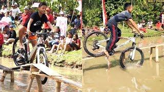 Cycling Competition On Pond farm fish on Indonesia Independence Day