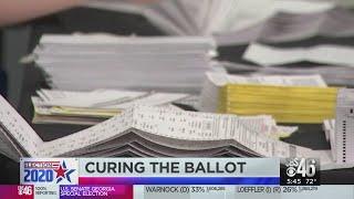 Volunteers hustle to cure ballots in Georgia