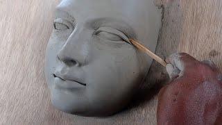 making a female face with water based clayhow to make a face with clay... sculpting face in clay