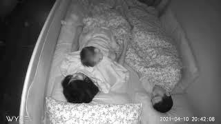 Baby monitor capture Baby playing with mom before going to bed